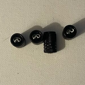Infinity valve Stem caps in black set of 4 NWT